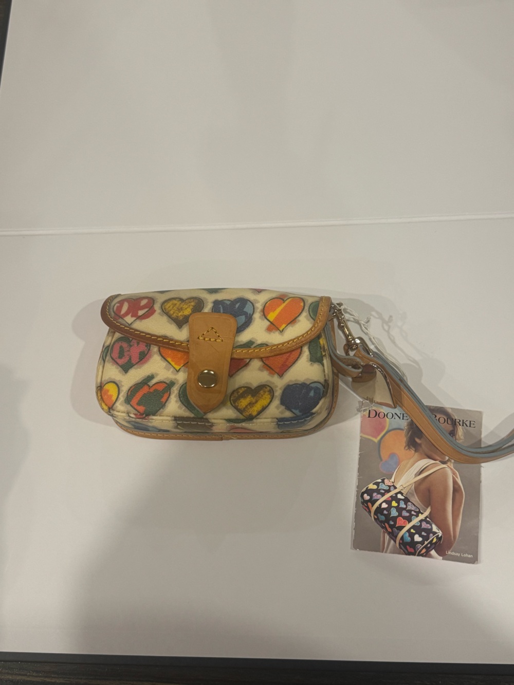 Dooney & Bourke Cream Canvas Mini Wristlet with Multicolor Heart Print